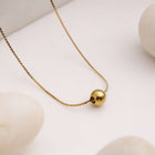 Golden Bead Pendant Necklace